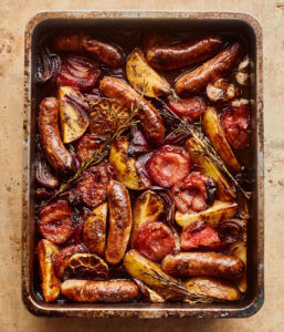 Sticky sweet and sour plums and sausages